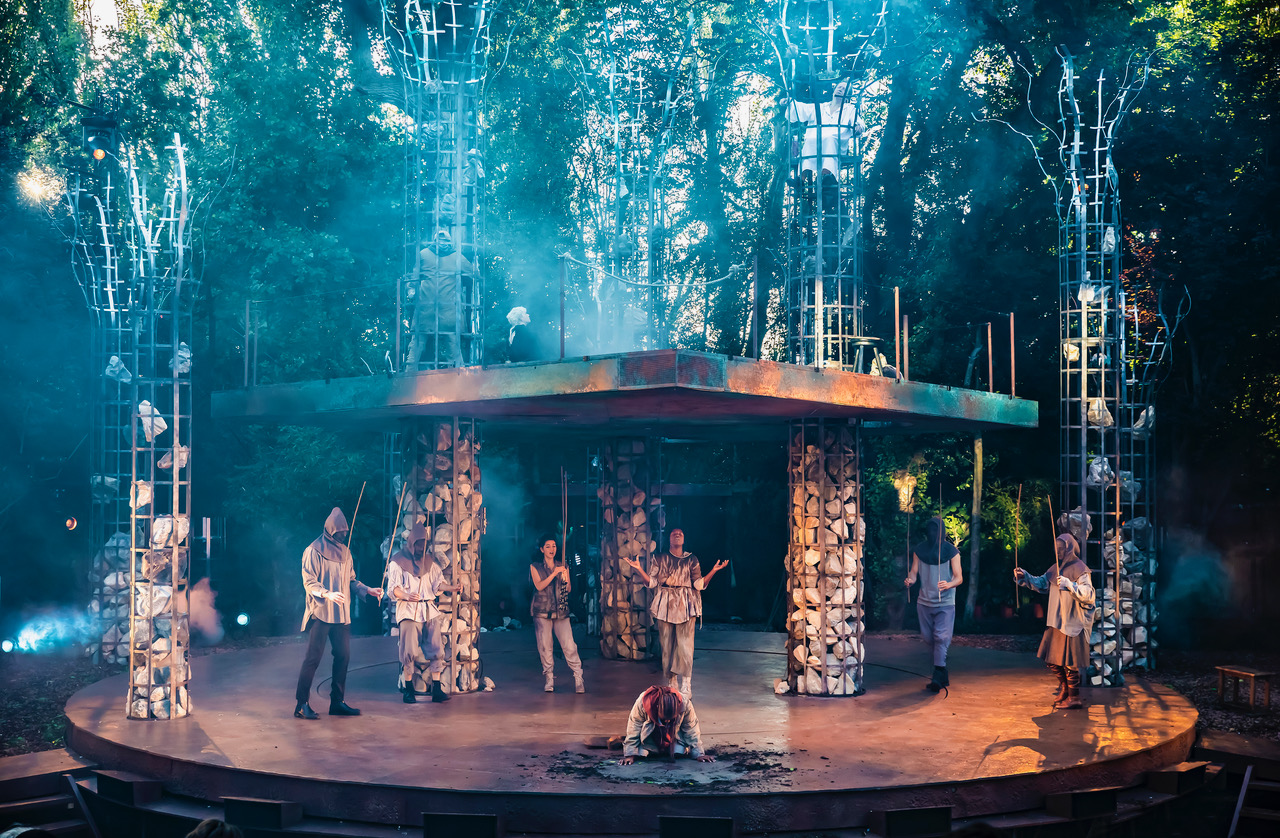 5. Woodnut (Dumile Sibanda) and Ensemble - Robin Hood Photo © Pamela Raith